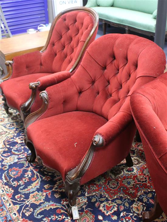 A Victorian walnut spoonback armchair, H.88cm W.66cm and a similar oak spoonback armchair, H. 98cm, W.70cm